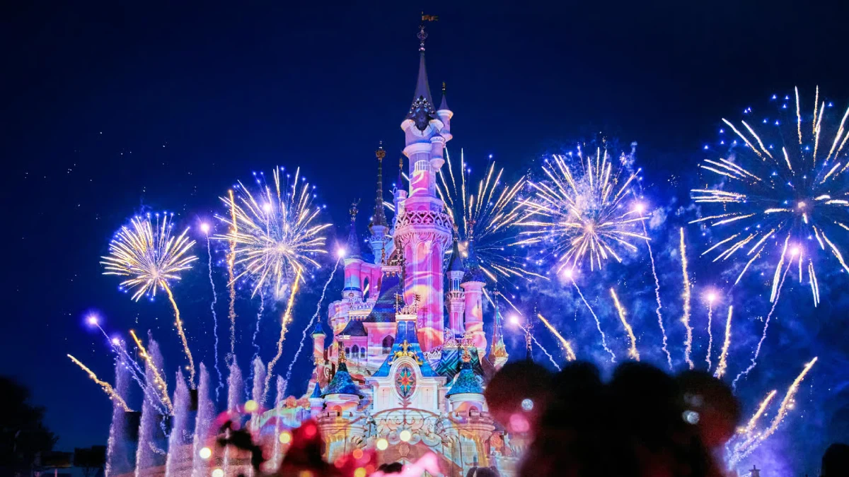 Fireworks light up the night sky above the Disney castle