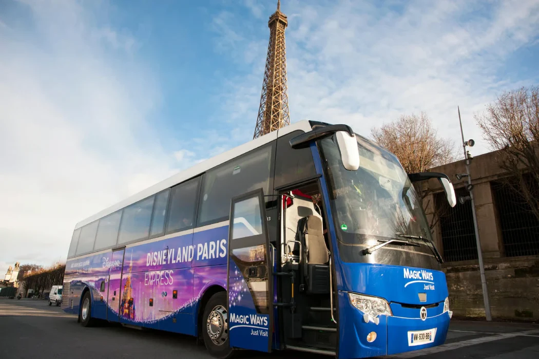 Disneyland Paris Express shuttle bus parked near the Eiffel Tower in Paris