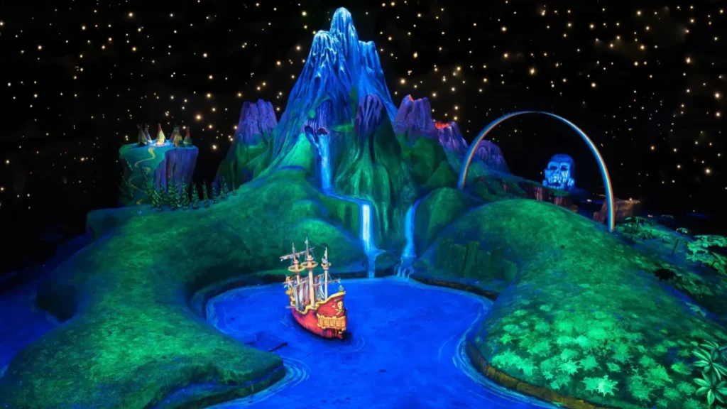 Colorful scene from Peter Pan’s Flight ride showing a ship sailing under the stars.